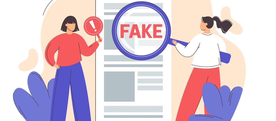 Two people investigate a website, one holds a magnifying glass to reveal the word "Fake"