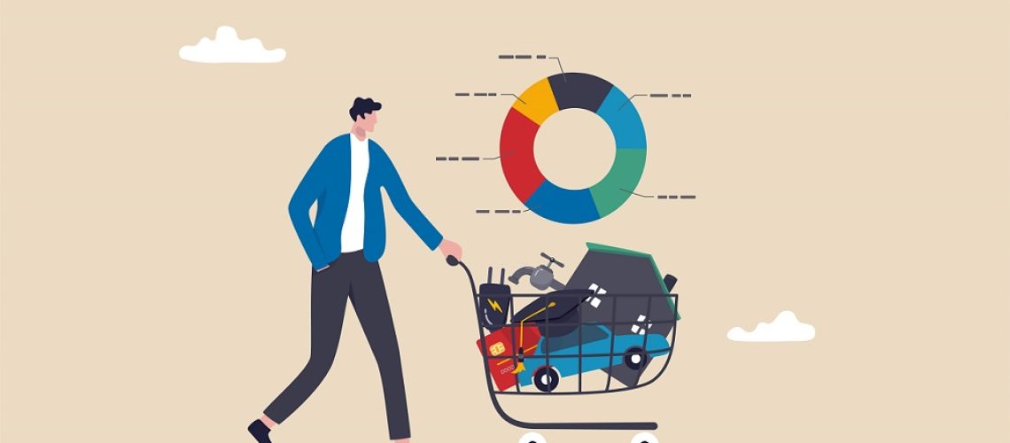 Person pushing shopping cart containing various items signifying living costs